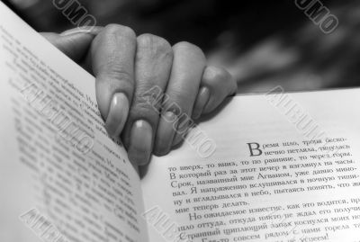 hand with book