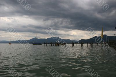 Dark rain clouds and lake Chiemsee