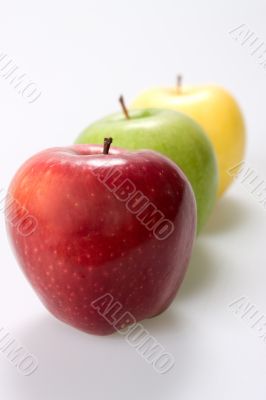 three apples on white background