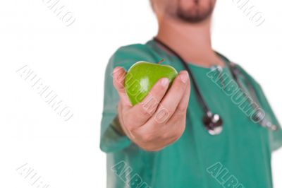 Doctor with an apple on his hand