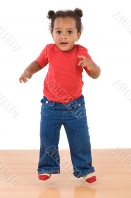 Adorable and beautiful african baby jumping