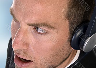 young businessman with headphones
