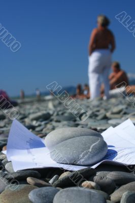 On a beach a paper