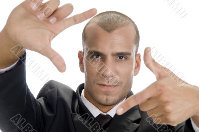 happy successful man gesturing finger frame