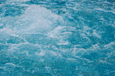 textured rippled deep blue water surface