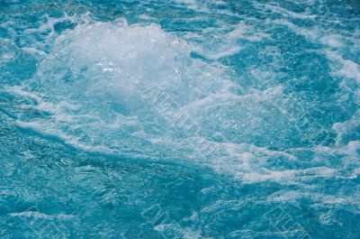 textured rippled deep blue water surface