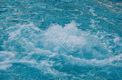 textured rippled deep blue water surface