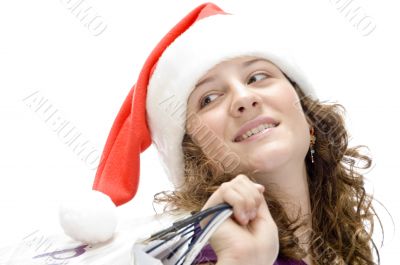 female with carry bags and santa cap