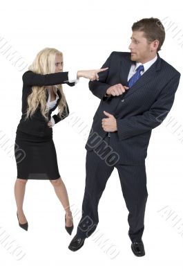 female pointing finger towards male