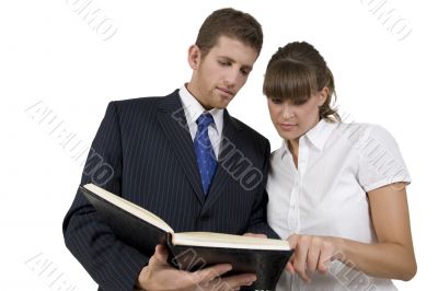 man and woman reading schdule
