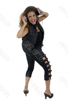 lady enjoying music with headphone