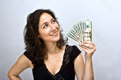Woman waving money
