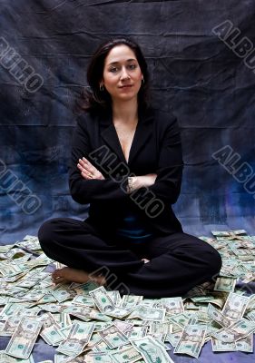 Woman sitting in money