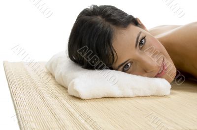 laying woman looking to camera