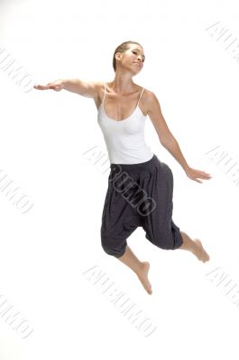 white woman jumps up