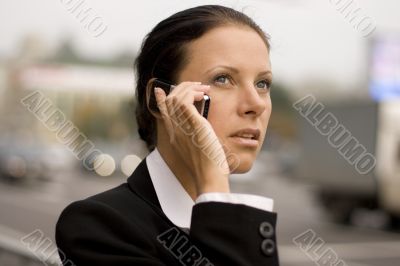 businesswoman talking by mobile phone