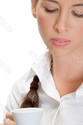 lady holding cup of tea