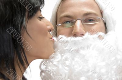woman kissing to santa man