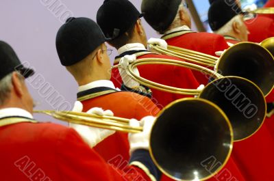 musicians playing music on hunting horn