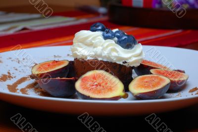 One blueberry and chocolate cake with figs