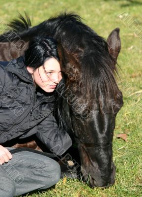 horse laid down and teen
