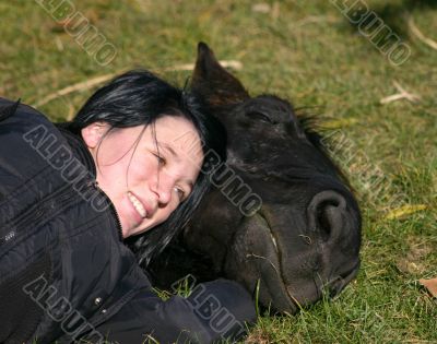 horse laid down and teen