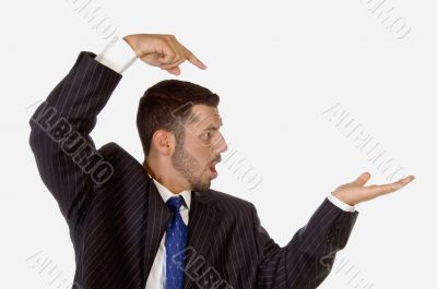 surprised businessman pointing his palm