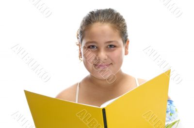 smiling girl with book looking you