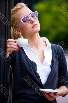 Beautiful young woman and coffee