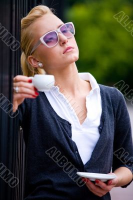 Beautiful young woman and coffee