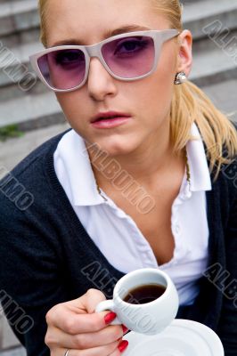 Beautiful young woman and coffee