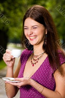 Beautiful young woman and coffee