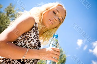 Lovely young woman with drink