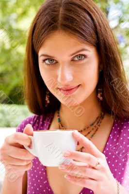 Beautiful young woman and coffee