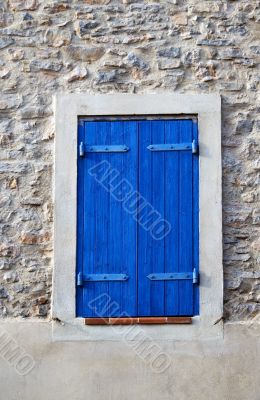 Window with blue shutter