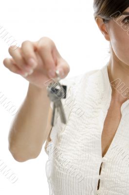 young woman offering keys