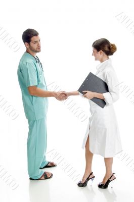 medical professionals shaking hands