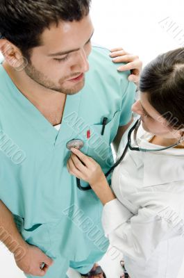 nurse examining the patient with stethoscope