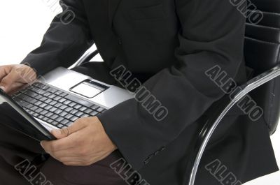 male hands typing an a laptop close up
