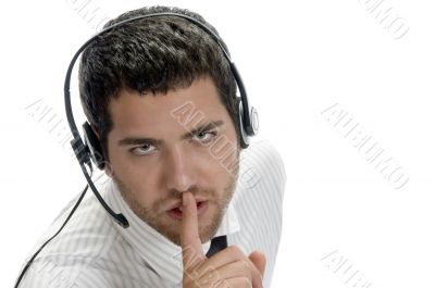 young adult male shushing