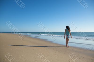 woman and shadow on the sand