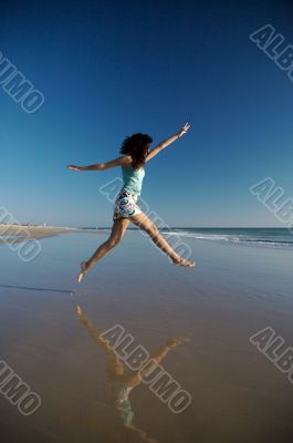 beach jumping reflected