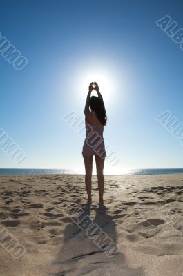 woman touching the sun