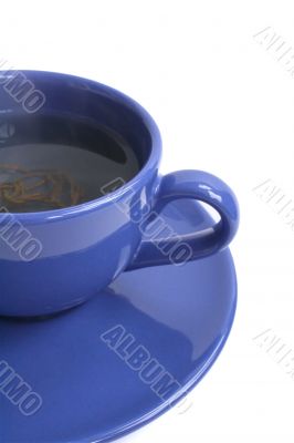 blue cup of green tea on the white background