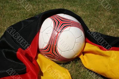Soccer ball in front of the german flag