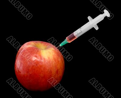 Red apple with a syringe