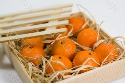 tangerines with straw