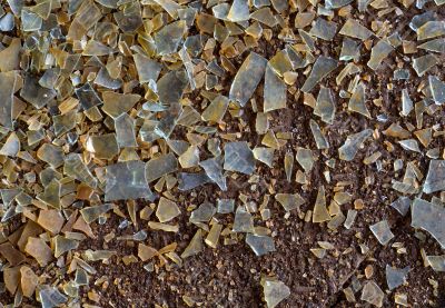 Dirty floor and splinters of glass