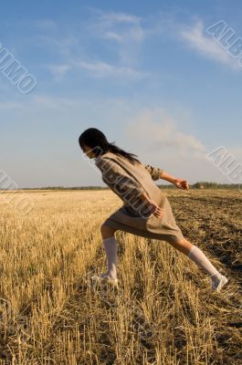 girl running on the field