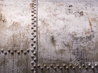 old metal tank with rivets